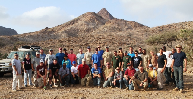 Volunteering wasn't just something Larkin ordered others to do. Here Larkin is with several members of his task force in Africa volunteering their time to help create the Beira Antelope Preserve. Photo courtesy of the 2-138th FAR PAO.